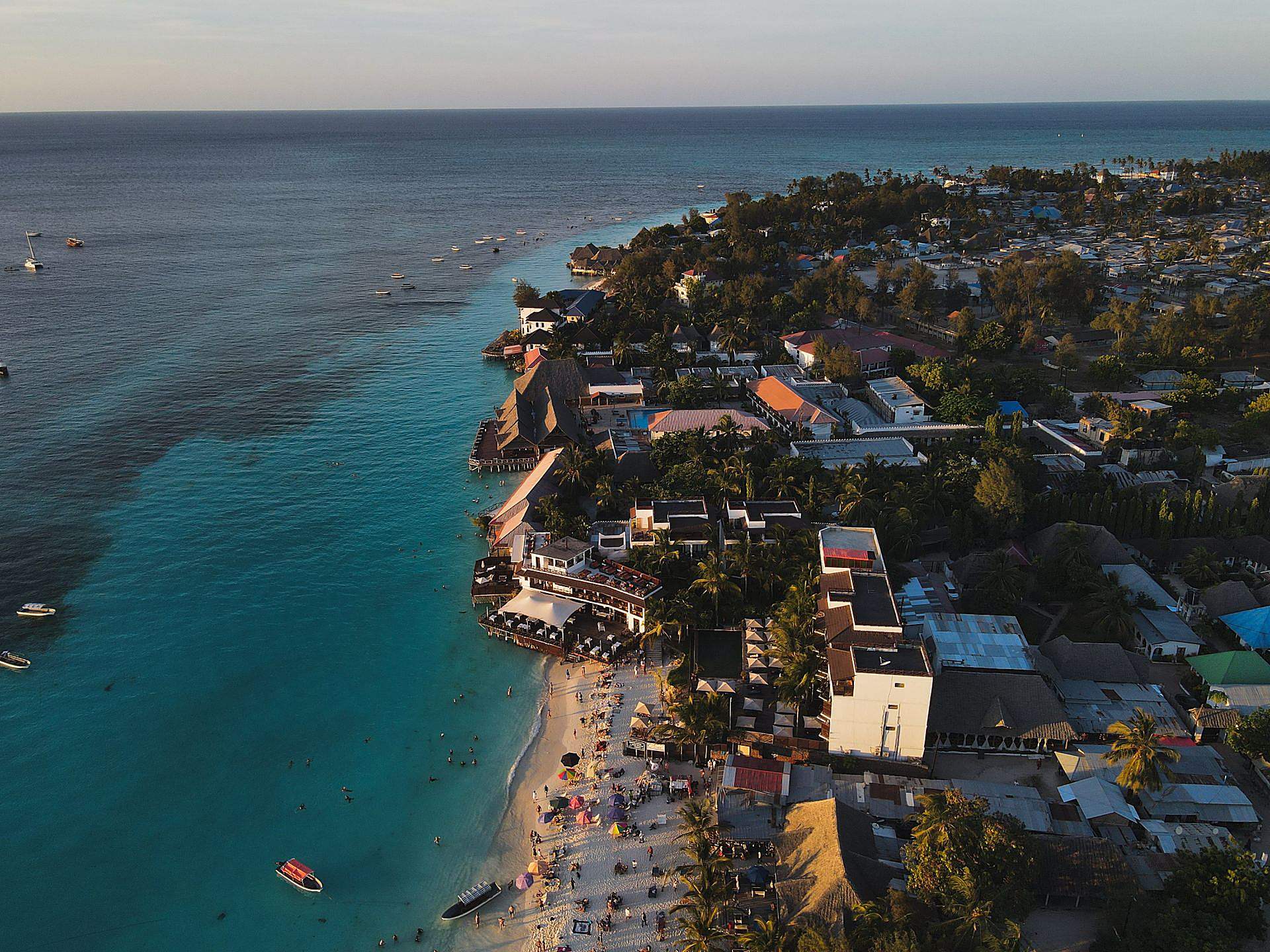 Bright turquoise water and boats at Nungwi, Zanzibar